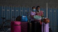 Kina prepolovila karantin za putnike koji stižu iz inostranstva