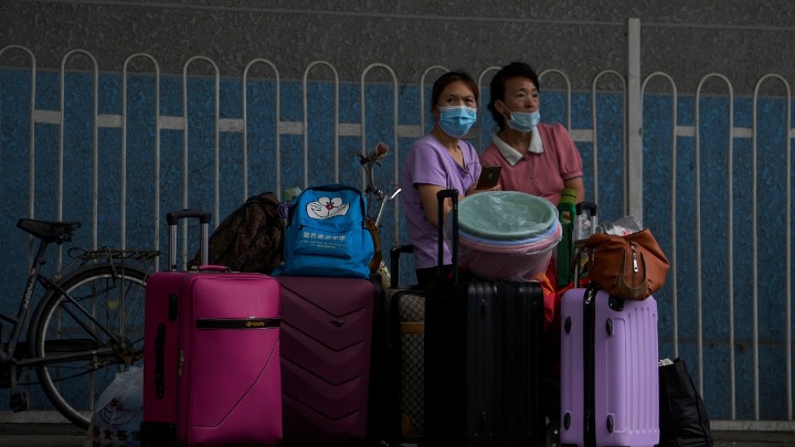 Kina prepolovila karantin za putnike koji stižu iz inostranstva