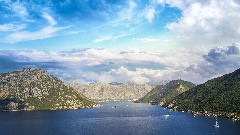 Облачно са кишом, крајем дана престанак падавина