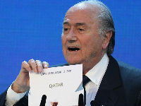 15279748fifa-president-joseph-blatter-opens-the-envelope-to-reveal-that-qatar-will-host-the-2022-wo.jpg