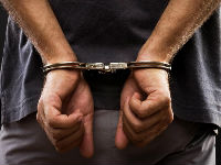 607041_handcuffed-manjpg
