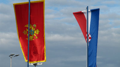 1137231_flagsofcroatiaandmontenegroinzagreb201110113624jpg